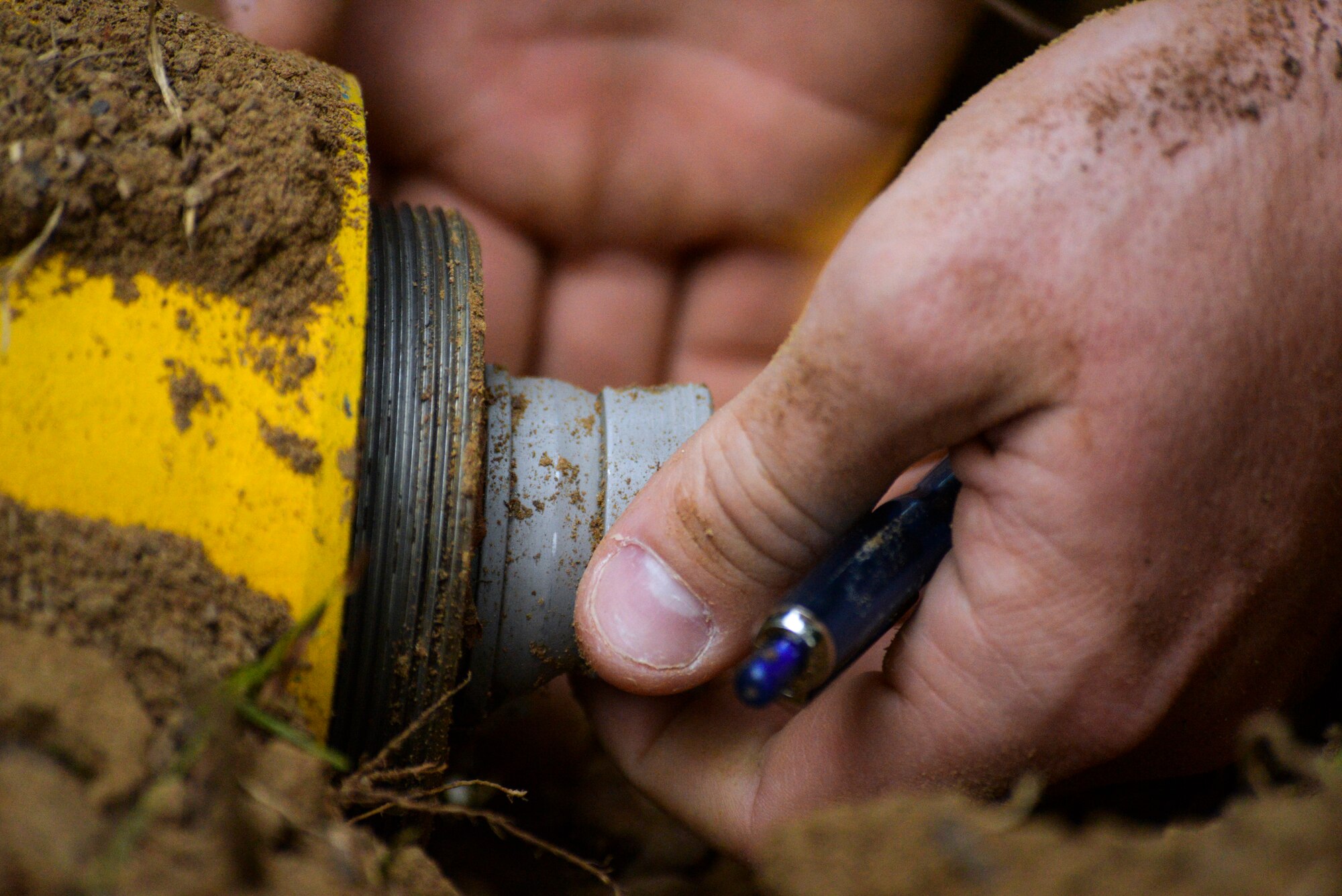 Staff Sgt. Alex Blair, explosive ordnance disposal technician with the 11th Civil Engineer Squadron, Joint Base Andrews, Maryland, removes the fuse from an unexploded ordnance as part of Operation Llama Fury, Aug. 26, 2015, at Seymour Johnson Air Force Base, North Carolina. The scenario simulated a stateside response to an in-flight emergency where a pilot had to dump munitions. (U.S. Air Force photo/Senior Airman Brittain Crolley)