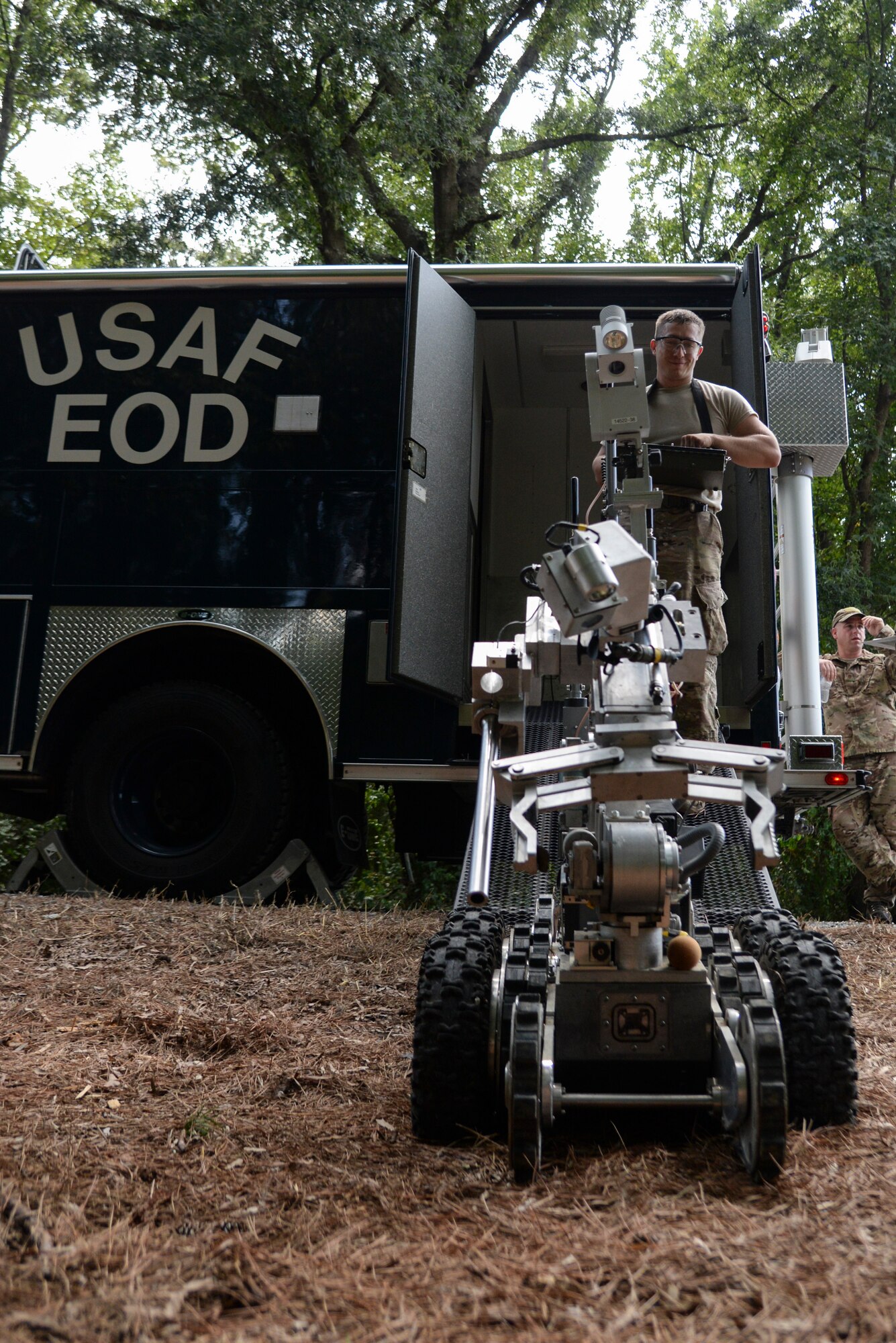 Senior Airman Erik Briggs, explosive ordnance disposal technician with the 23rd Civil Engineer Squadron, Moody Air Force Base, Georgia, mobilizes a robot to remotely identify a suspicious device as part of Operation Llama Fury, Aug. 25, 2015, at Seymour Johnson Air Force Base, North Carolina. EOD technicians commonly use robots as a method of first entry to keep themselves safe during crisis response situations. (U.S. Air Force photo/Senior Airman Brittain Crolley)