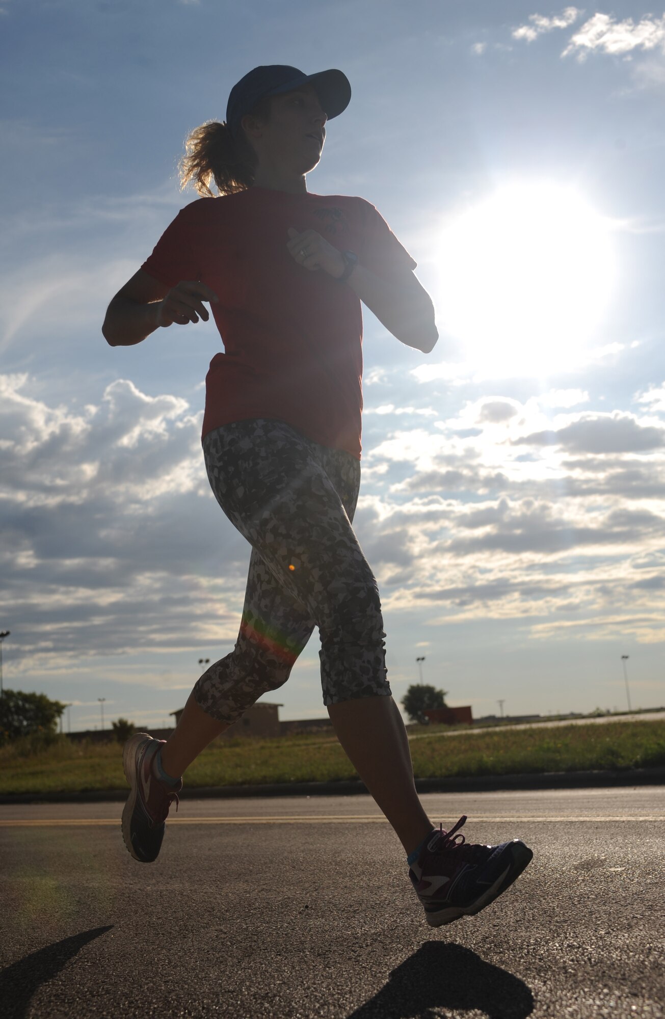 1st Lt. Lauren Olme, 34th Bomb Squadron pilot, participates in a 5k Fun Run during a Comprehensive Airmen Fitness day, at Ellsworth Air Force Base, S.D., Sept. 3, 2015. Physical activity and healthy nutrition habits help Airmen stay fit to fight. (U.S. Air Force photo by Airman Sadie Colbert/Released)