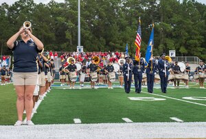 The Joint Base Charleston Honor Guard performs on the Charleston Southern University football field Sept. 3, 2015, in Charleston, S.C. CSU hosted a military appreciation night during its season opener. CSU beat the North Greenville University Crusaders 41-14. (U.S. Air Force photo/Senior Airman George Goslin) 