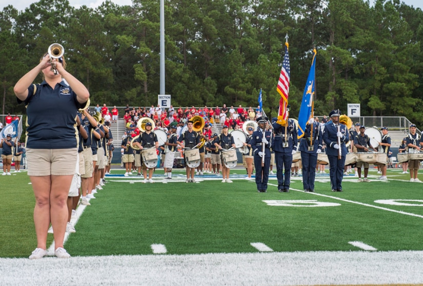 The Joint Base Charleston Honor Guard performs on the Charleston Southern University football field Sept. 3, 2015, in Charleston, S.C. CSU hosted a military appreciation night during its season opener. CSU beat the North Greenville University Crusaders 41-14. (U.S. Air Force photo/Senior Airman George Goslin) 