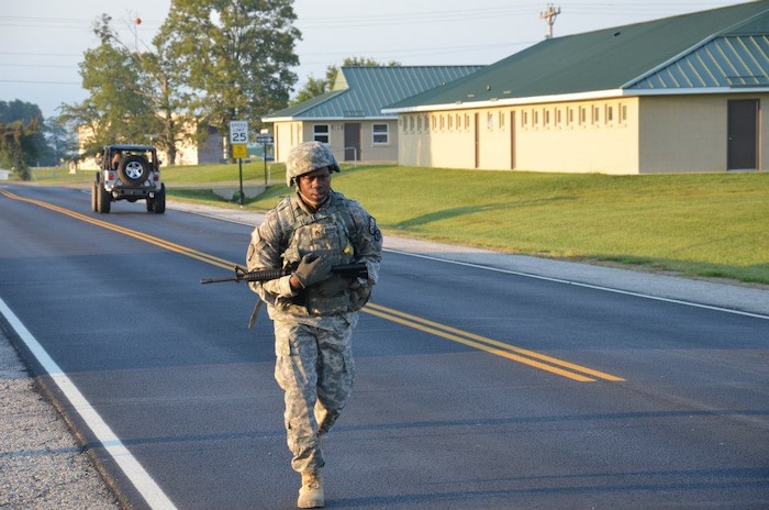 Army Staff Sgt. Armond Evansscott, 841st Transportation Battalion freight non-commissioned officer in charge, located at Joint Base Charleston – Weapons Station, S.C., rucks for 12 miles at Camp Atterbury Army Base in Edinburgh, IN, Aug. 27, 2015. This was the third and final day for the Army Materiel Command-level Best Warrior of the Year Competition. (Courtesy photo)