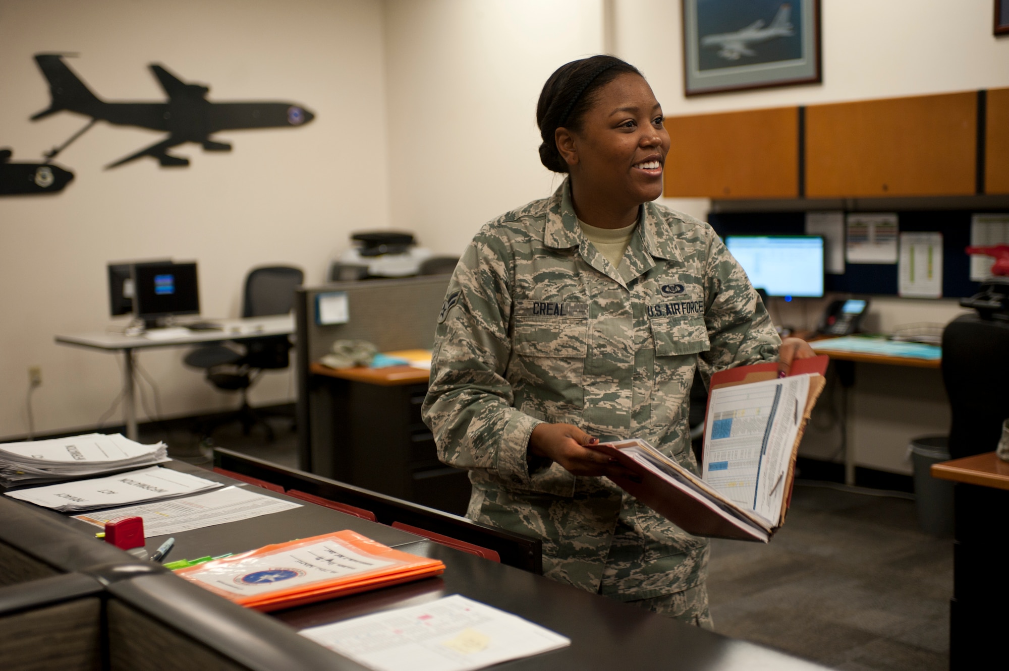 Airman 1st Class Joy Creal, 93rd Air Refueling Squadron aviation resource manager, organizes files Sept. 3, 2015, at Fairchild Air, Force Base Wash. Creal keeps track of aircrew member training and ensures they stay qualified to perform their duties. Her leadership selected her as one of Fairchild’s Finest, a weekly recognition program that highlights top-performing Airmen. (U.S. Air Force photo/Airman Sean Campbell)