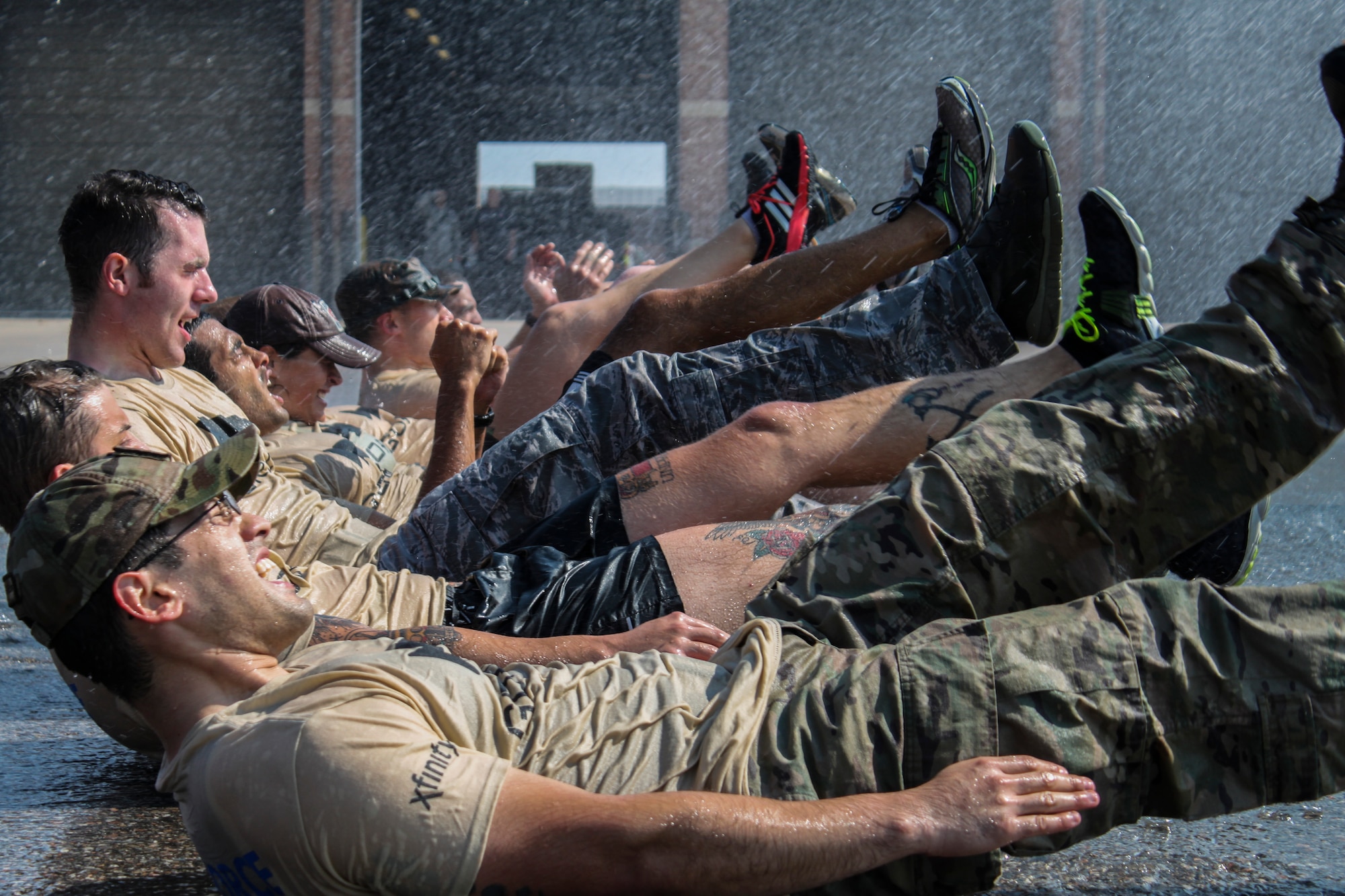 PETERSON AIR FORCE BASE, Colo. – Participants in the Team Cohesion Challenge complete a series of intense exercises over five hours and 7-10 miles during a GoRuck Light, Aug. 30. The free event is led by Special Operations Cadre with the purpose of pushing the participants into becoming a team over various obstacles designed to push them physically and mentally. (courtesy photo by Airman 1st Class Keshia Corpuz)