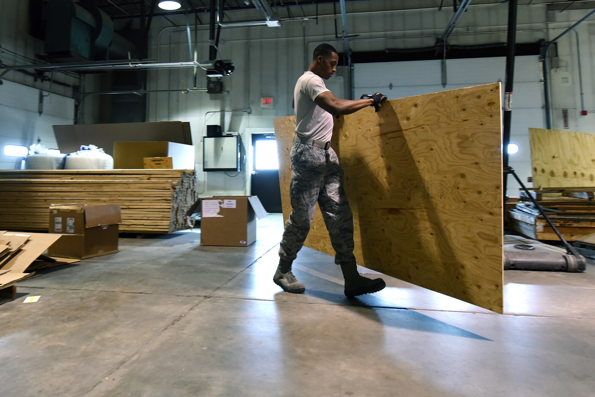 Senior Airman Lagarrick Gantt, 341st Logistics Readiness Squadron packing and crating journeyman, builds a crate for shipping Aug. 2, 2015, at Malmstrom Air Force Base, Mont. The packaging and crating shop has a team of five personnel pushing out 20 to 30 crates a month and up to 20 pieces of equipment daily. (U.S. Air Force photo/Chris Willis)