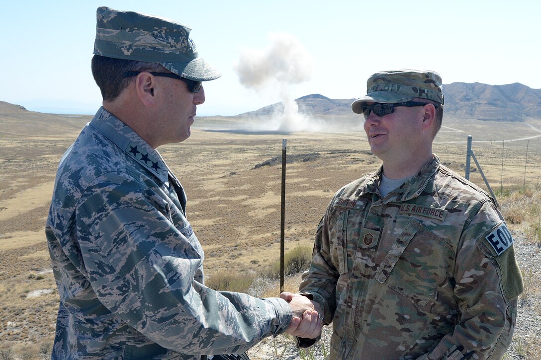 Lt. Gen. Lee K. Levy II, Air Force Sustainment Center commander, visited Hill Air Force base for an immersion tour Aug. 31- Sept. 1. During his visit, Levy travelled to the Utah Test and Training Range where Master Sgt. Joseph Upton, and a team from the 775th Explosive Ordnance Disposal Flight, disposed of a 10,000 lb. solid-propellant motor. (Air Force Photo by Alex R. Lloyd) 

