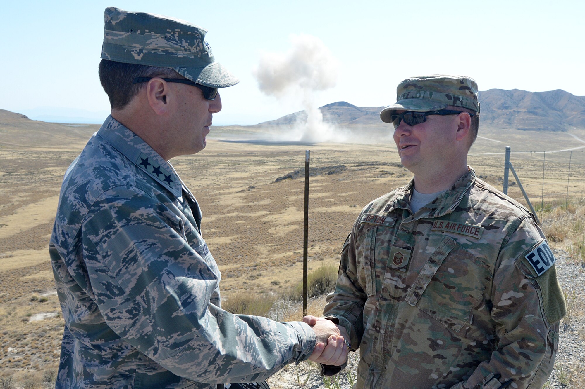 Lt. Gen. Lee K. Levy II, Air Force Sustainment Center commander, visited Hill Air Force base for an immersion tour Aug. 31- Sept. 1. During his visit, Levy travelled to the Utah Test and Training Range where Master Sgt. Joseph Upton, and a team from the 775th Explosive Ordnance Disposal Flight, disposed of a 10,000 lb. solid-propellant motor. (Air Force Photo by Alex R. Lloyd) 

