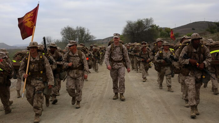Students with the Field Medical Service Technician Course, led by HM2 Hoff, an instructor with FMTB West, reach the turn-around point during their 6-mile hike at Marine Corps Base Camp Pendleton, Calif., Sept. 1, 2015. The hike is one of three hikes that every student must complete on their journey to becoming “greenside” corpsmen, working side-by-side and caring for Marines. 
