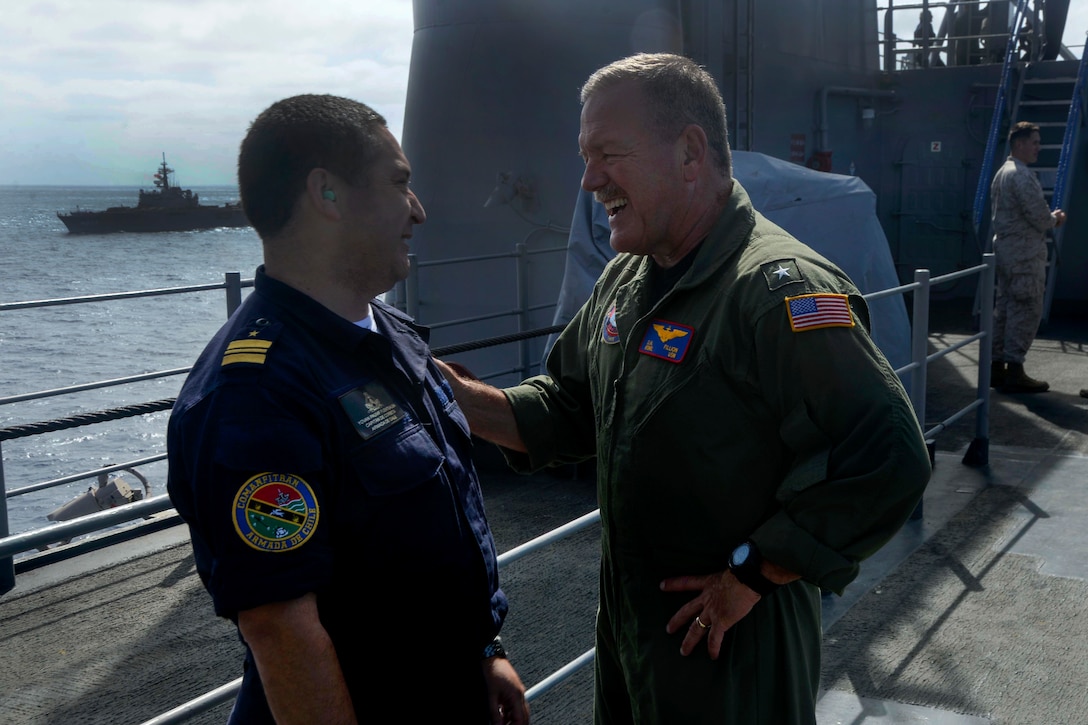 U.S. Navy Rear Adm. Daniel Fillion, right, talks with a Chilean naval service member aboard the amphibious assault ship USS Boxer during Dawn Blitz 2015 in the Pacific Ocean, Sept. 4, 2015. Fillion is commander of Expeditionary Strike Group 3. U.S. Navy photo by Petty Officer 3rd Class Jesse Monford