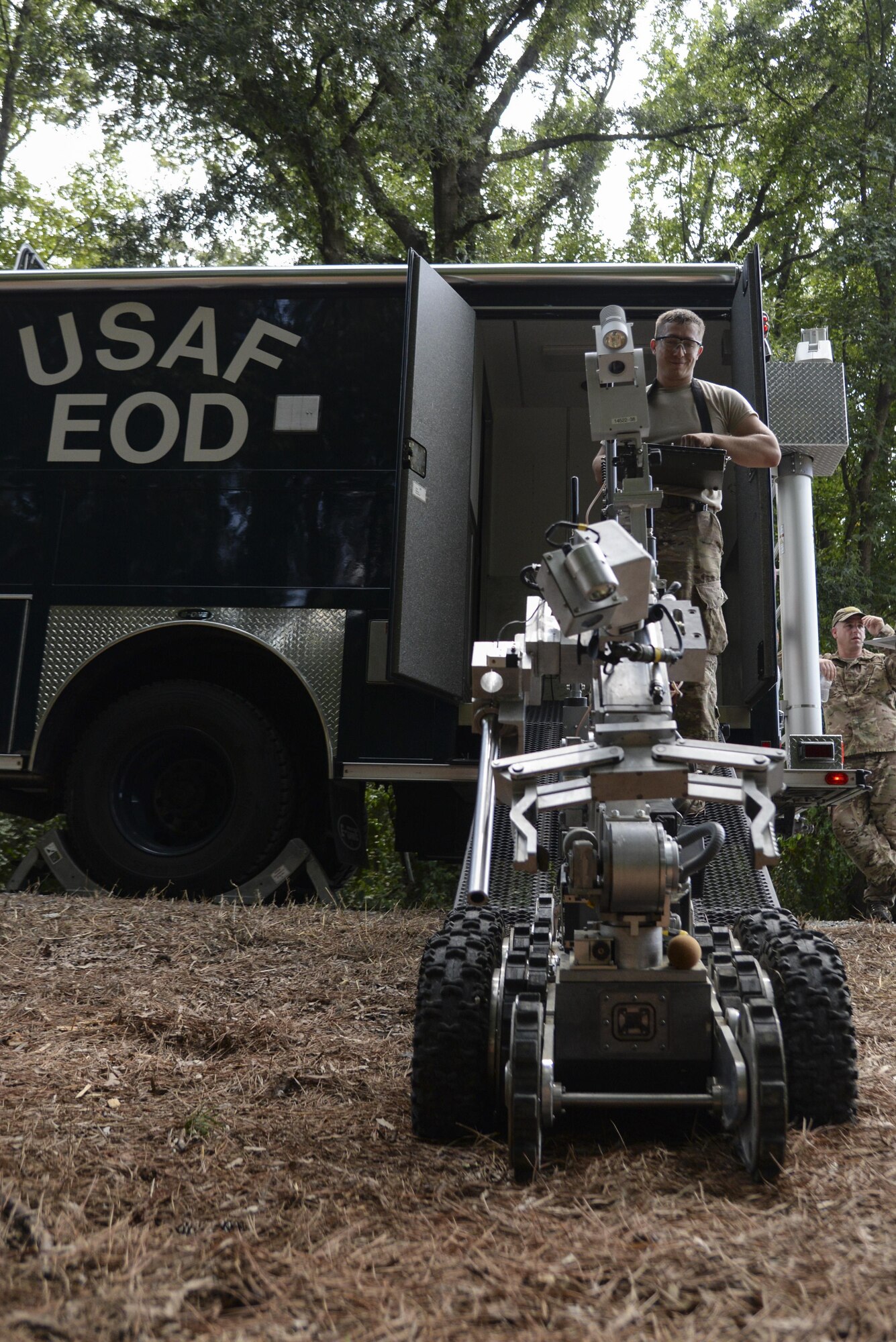 Senior Airman Erik Briggs, an explosive ordnance disposal technician with the 23rd Civil Engineer Squadron at Moody Air Force Base, Ga., mobilizes a robot to remotely identify a suspicious device as part of Operation Llama Fury, Aug. 25, 2015, at Seymour Johnson Air Force Base, N.C. EOD technicians commonly use robots as a method of first entry to keep themselves safe during crisis response situations. (U.S. Air Force photo/Senior Airman Brittain Crolley)