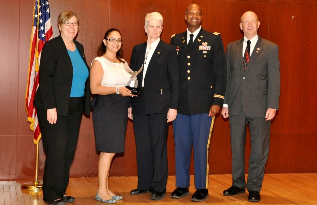Earlier this year, Erica LaBeste (second from left), chief of the Real Estate and Real Property Support Branch for the U.S. Army Corps of Engineers, New York District, was recognized by the New York City Federal Executive Board for staff development initiatives. Above, Erica with Real Estate Chief Noreen Dresser (center), Lt. Col. John Knight (second from right), and members of the Federal Executive Board.  