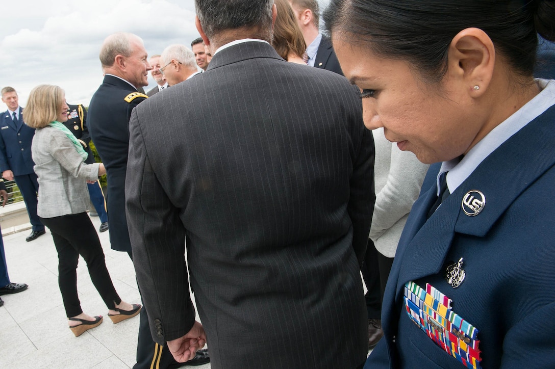 A U.S. Air Force master sergeant waits to meet U.S. Army Gen. Martin E. Dempsey, left center, chairman of the Joint Chiefs of Staff, at the U.S. Embassy in Berlin, Sept. 9, 2015. DoD photo by D. Myles Cullen