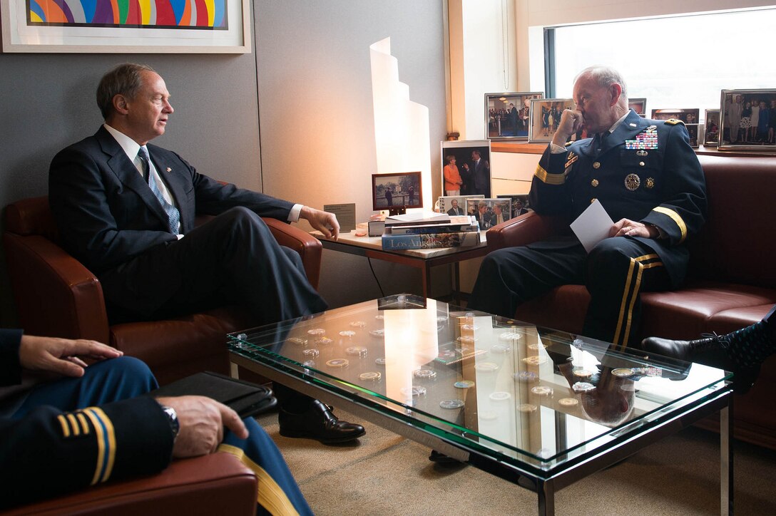 U.S. Army Gen. Martin E. Dempsey, right, chairman of the Joint Chiefs of Staff, meets with U.S. Ambassador to Germany John Emerson at the U.S. Embassy in Berlin, Sept. 9, 2015. DoD photo by D. Myles Cullen