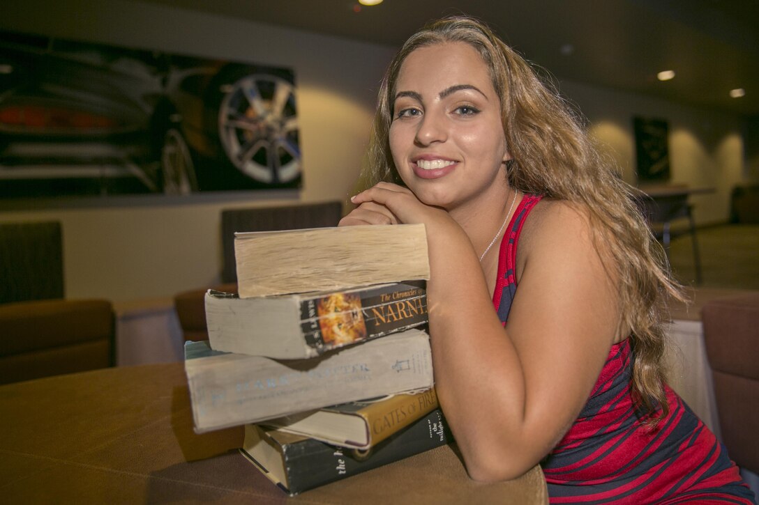 Lance Cpl. Meagan Shihab, defense clerk, Defense Services Organization, Headquarters Battalion, enjoys reading fantasy and science fiction books. Her favorite series include the Lord of the Rings and the Inheritance series. (Official Marine Corps photo by Lance Cpl. Levi Schultz/Released)