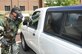 Master Sgt. Danny Groves, a services craftsman with the 910th Force Support Squadron, wipes down a vehicle with M9 paper to determine if a chemical agent is present. Groves and fellow members of the squadron were participating in a chemical, biological, radiological, nuclear and high yield explosive training (CBRNE) exercise here, August 1, 2015. (U.S. Air Force photo/ Tech. Sgt. Rick Lisum)