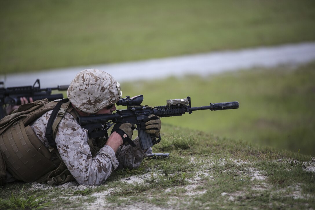 A Marine with Weapons Company, 2nd Battalion, 6th Marine Regiment, sights in on a target during a weapons zeroing range at G21, Camp Lejeune, N.C., Sept. 3, 2015. The unit was zeroing their weapons to prepare for an upcoming deployment with the 26th Marine Expeditionary Unit. (U.S. Marine Corps photo by Cpl. Paul S. Martinez)