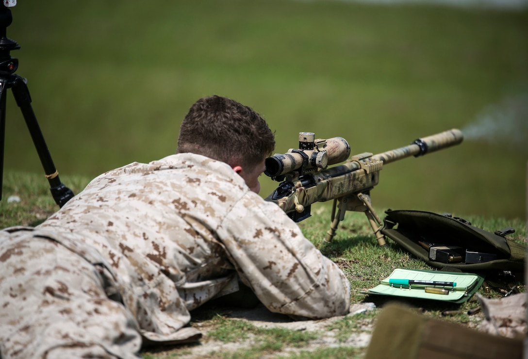 A Marine with Sniper Platoon, Weapons Company, 2nd Battalion, 6th Marine Regiment, fires on a target during a weapons zeroing range at G21, Camp Lejeune, N.C., Sept. 3, 2015. The sniper rifles used during the range included the M110 semi-automatic sniper rifle and M40 bolt-action sniper rifle. (U.S. Marine Corps photo by Cpl. Paul S. Martinez)