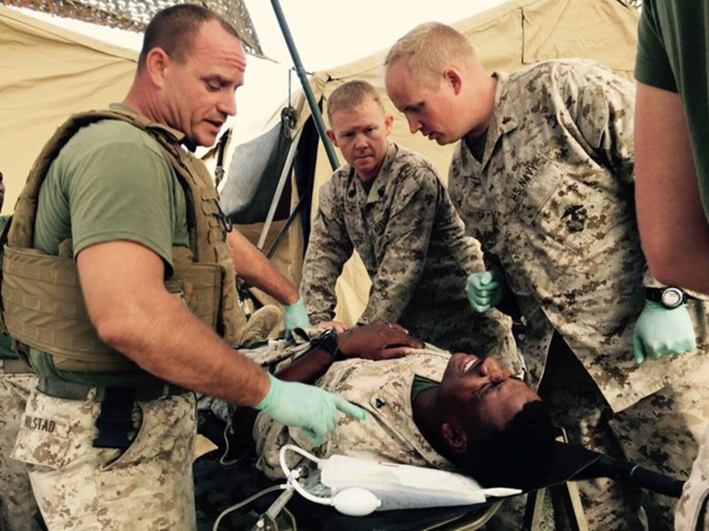 Sailors and Marines of 1st Medical Battalion conduct a mass casualty drill during Exercise Dawn Blitz 15.
