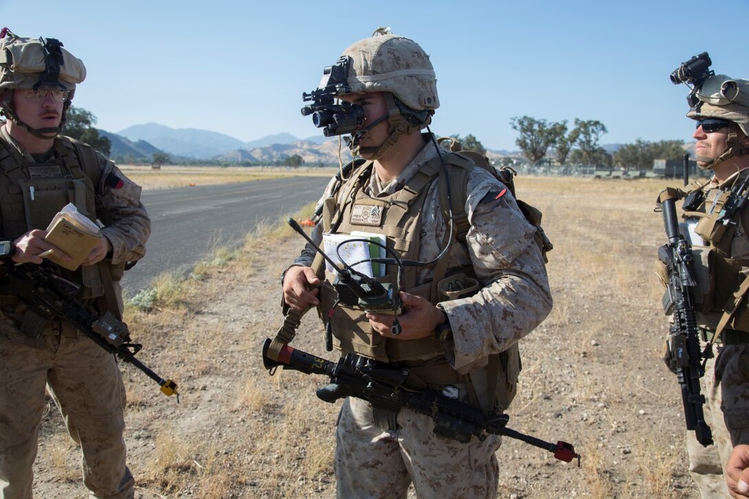 Marines attached to the Battalion Landing Team, 2nd Battalion, 1st Marine Division with the 13th Marine Expeditionary Unit (MEU), conduct a Tactical Recovery of Aircraft and Personnel exercise to recover simulated injured allies during Realistic Urban Training (RUT) at Fort Hunter Liggett, California, Sept. 2, 2015. RUT is the final ground-based training requirement prior to deployment, as the 13th MEU moves toward operating embarked at sea. (U.S. Marine Corps photo by Cpl. Briauna Birl / Released)