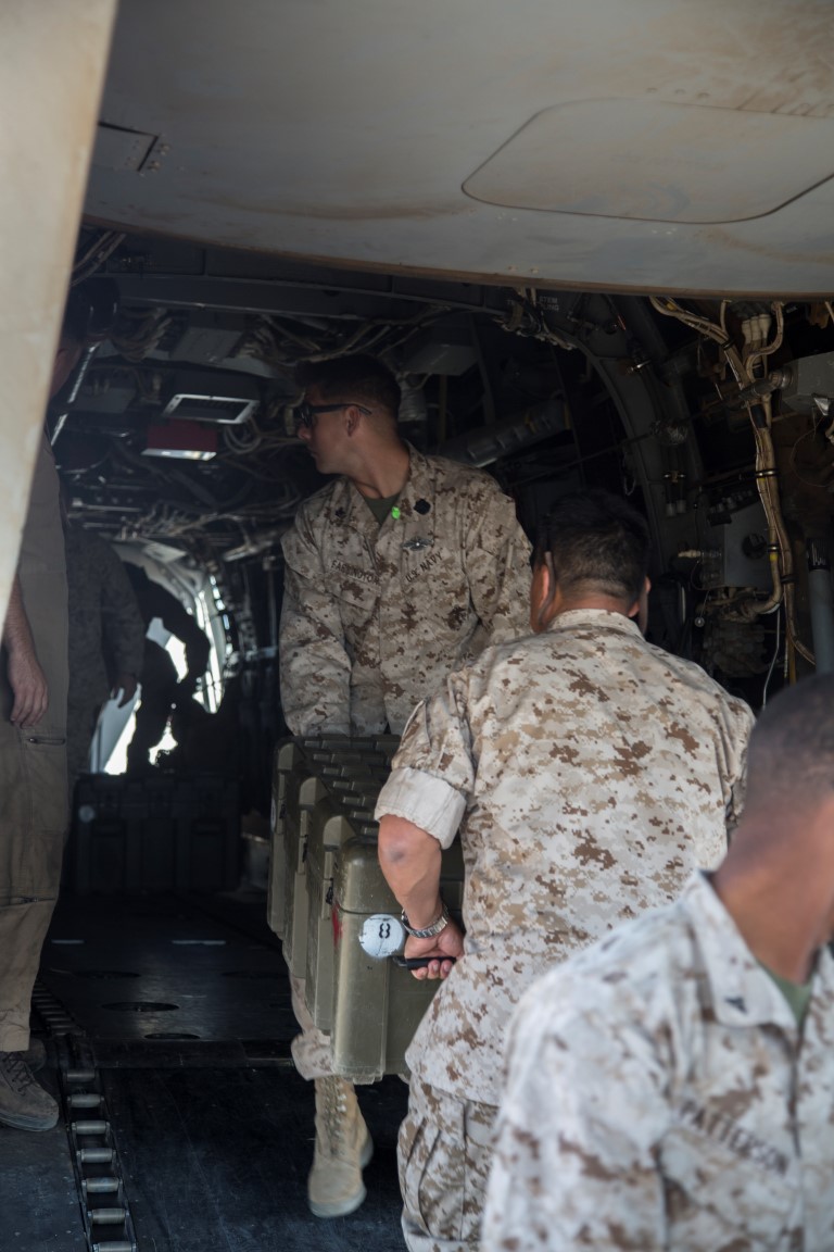 U.S. Marines and Sailors assigned to the 13th Marine Expeditionary Unit (MEU) load the Fly Away Resuscitative Surgical System aboard an MV-22B Osprey with Marine Medium Tiltrotor Squadron (VMM) 166 Reinforced during the Realistic Urban Training (RUT) Exercise at Fort Hunter Liggett, California, Sept. 4, 2015. RUT is the final ground-based training requirement prior to deployment as the 13th MEU moves toward operating embarked at sea.  (U.S. Marine Corps photo by Sgt. Tyler C. Gregory/released)