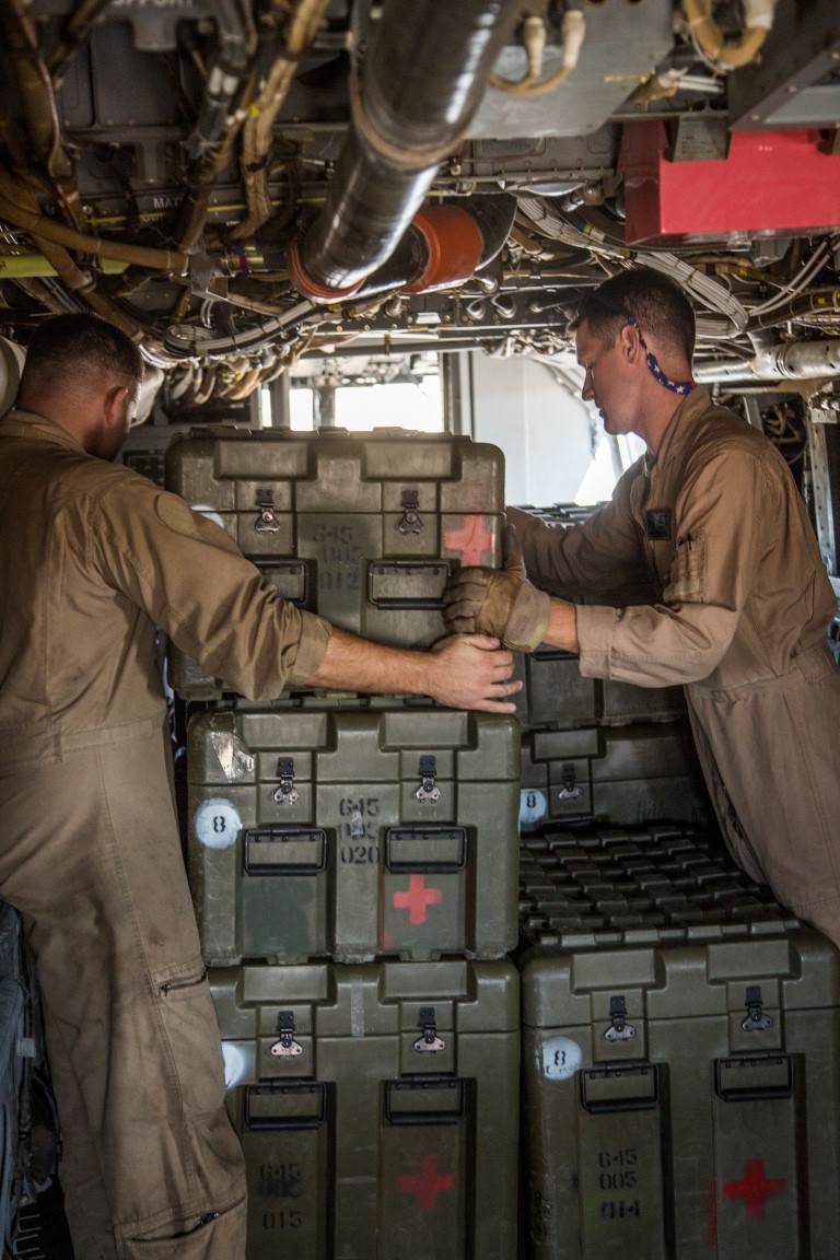 U.S. Marines assigned to the 13th Marine Expeditionary Unit (MEU) load the Fly Away Resuscitative Surgical System aboard an MV-22B Osprey with Marine Medium Tiltrotor Squadron (VMM) 166 Reinforced during the Realistic Urban Training (RUT) Exercise at Fort Hunter Liggett, California, Sept. 4, 2015. RUT is the final ground-based training requirement prior to deployment as the 13th MEU moves toward operating embarked at sea. (U.S. Marine Corps photo by Sgt. Tyler C. Gregory/released)