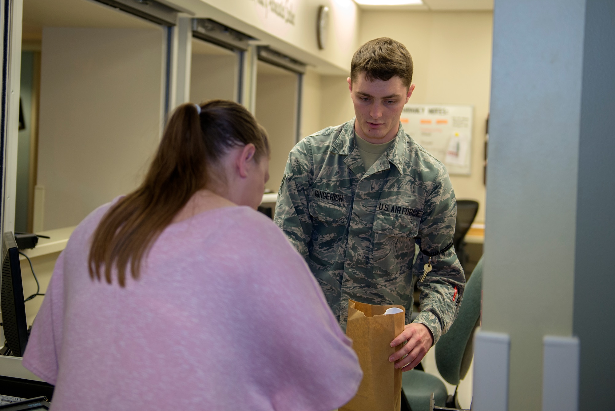 U.S. Air Force Airman 1st Class Chris Gingerich, 23d Medical Group pharmacy technician, prepares a customer’s prescription order Sept. 8, 2015, at Moody Air Force Base, Ga. The pharmacy administers care for 400 to 500 customers per day by filling prescriptions and ensuring customers know how to consume them properly. (U.S. Air Force Airman 1st Class Greg Nash/Released) 