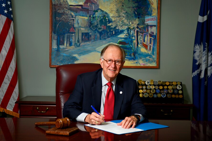 Former U.S. Air Force Capt. Joseph McElveen sits at his desk in Sumter, S.C., Aug. 25, 2015. McElveen took the leadership skills he learned during his time in service and used them to enhance the relationship between Shaw and its surrounding community. (U.S. Air Force photo by Senior Airman Jensen Stidham/Released)