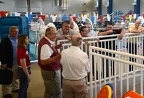 Tony Meyer, a Center for the Intrepid tour guide, shows civic leaders from Barksdale Air Force Base, Louisiana the state of art swimming facilities that wounded warriors use for rehabilitation Sept. 1, 2015 at Joint Base San Antonio-Lackland, Texas. The civics consisted of mayors, clergymen, and business leaders. The civic leader tour’s purpose is to strengthen the relationships between the private and government sectors and to share better business practices. (U.S. Air Force photo by Benjamin Faske) (released)