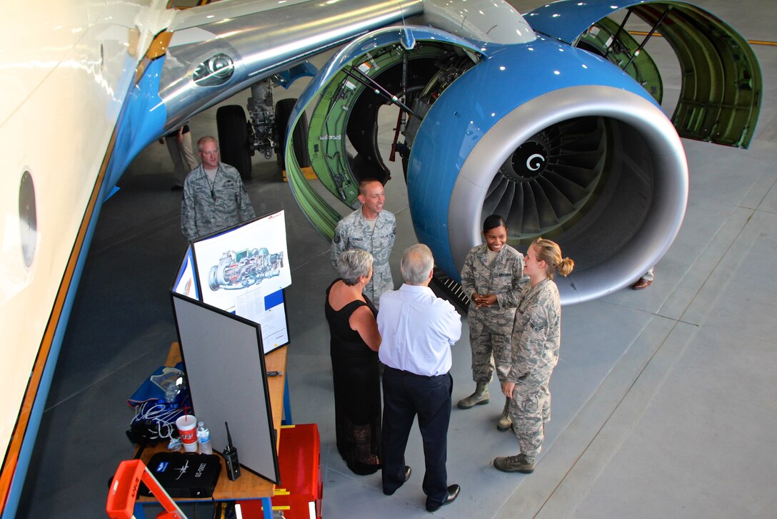 Maintainers of the C-40C planes at the 932nd Airlift Wing, speak to local business leaders assembled during a special Belle-Scott civic leader engagement held at Scott Air Force Base. To help strengthen the relationship between the city of Belleville and Scott, the Belleville Plan, which is now the Belle-Scott committee, was created to make a stronger bond between the base and area leaders. Setting aside a special evening, the 932nd Airlift Wing setup part of the hangar and a C-40C plane for civic leader visits from mostly St. Clair County's civic and business leaders. The local group was served snacks, toured facilities, met medical staff and heard a mission briefing. The C-40C planes of the Air Force Reserve Command unit in Illinois are used to transport our nation's civilian and military leadership that touched on the role of both the Guard and Reserve at the base located near Belleville. The Belle-Scott Committee is comprised of local community leaders who meet with Scott Air Force Base officials on a recurring basis. (U.S. Air Force photo by Maj. Stan Paregien)