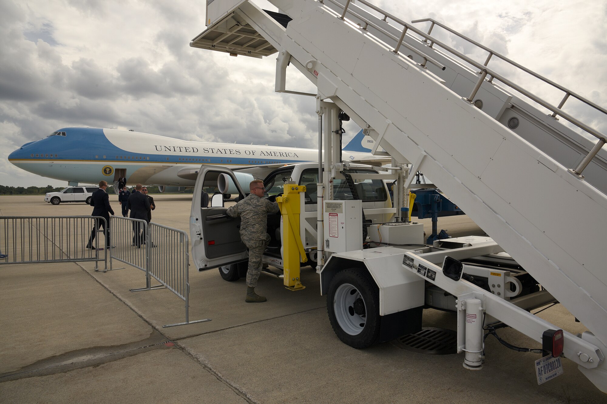 Staff Sgt. Bryan Russell prepares to drive out the air stairs to Air Force One during a visit by President Barack Obama to Selfridge Air National Guard Base, Mich., Sept. 9, 2015. Russell is a member of the 127th Wing, Michigan Air National Guard. President Barack Obama stopped at the base during a trip to nearby Macomb Community College in Warren, Mich., to discuss federal higher education initiatives. (U.S. Air National Guard photo by Master Sgt. David Kujawa / Released)