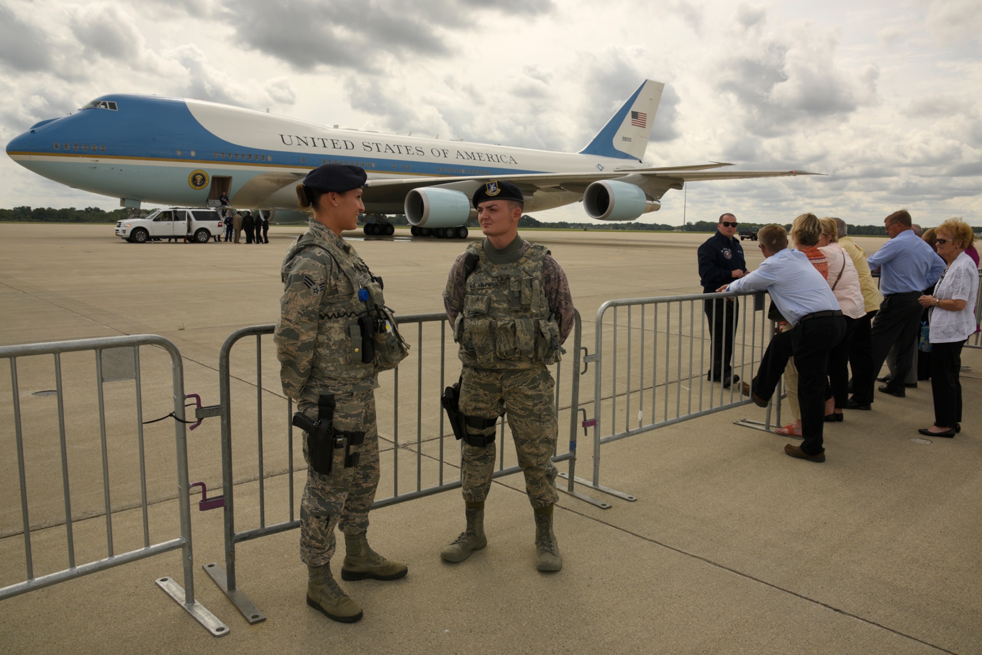 Senior Airman Lisa Duval and Airman 1st Class Xavier Lopez, both members of the 127th Wing Security Forces Squadron, provide security for Air Force One at Selfridge Air National Guard Base, Sept. 9, 2015. President Barack Obama stopped at the base during a trip to nearby Macomb Community College in Warren, Mich., to discuss federal higher education initiatives. (U.S. Air National Guard photo by Master Sgt. David Kujawa / Released)