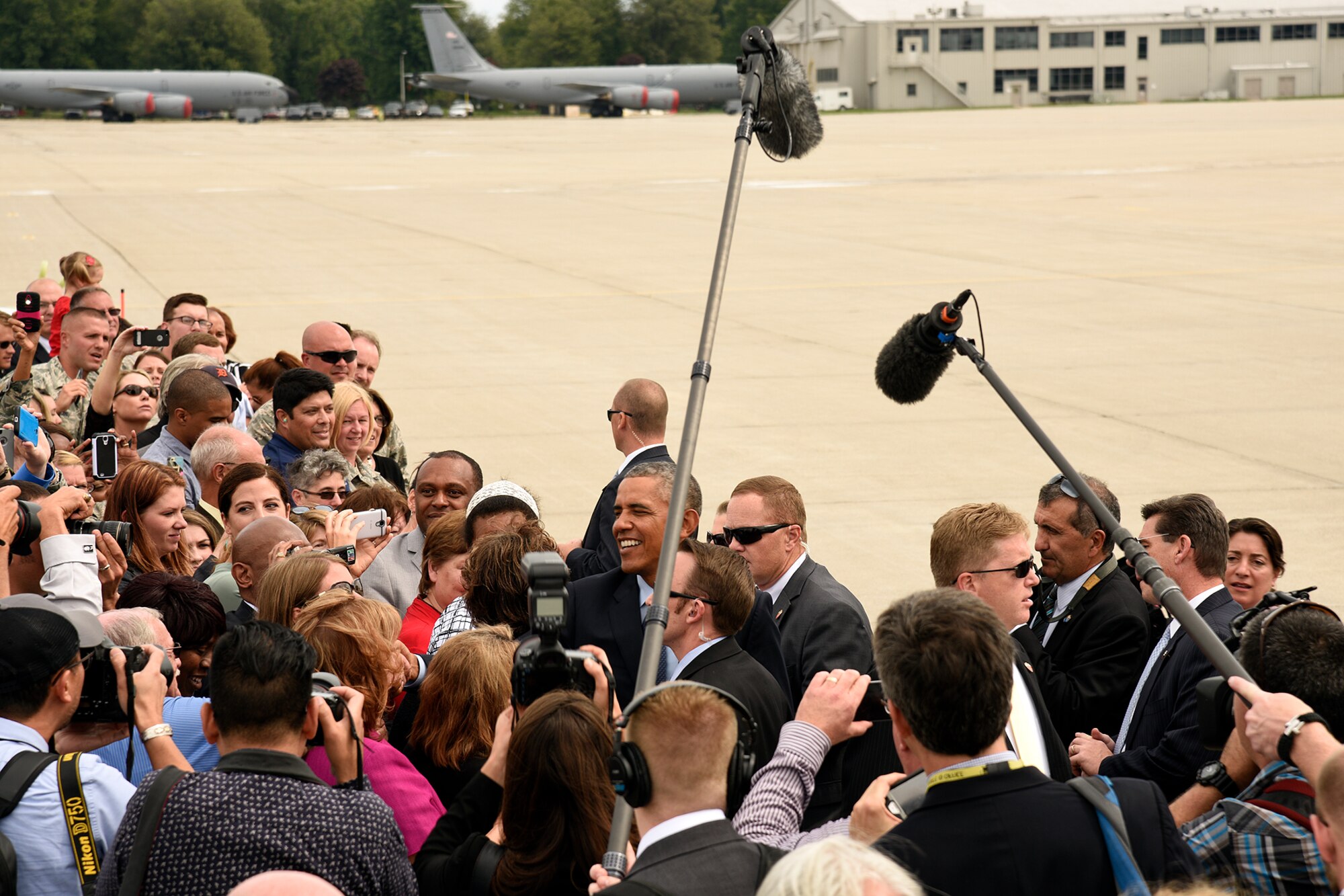 President Barack Obama shakes hands with Airmen and civilian guests during a brief stop at Selfridge Air National Guard Base, Mich., Sept. 9, 2015. The president stopped at the base during a trip to nearby Macomb Community College in Warren, Mich., to discuss federal higher education initiatives. (U.S. Air National Guard photo by Master Sgt. David Kujawa / Released)