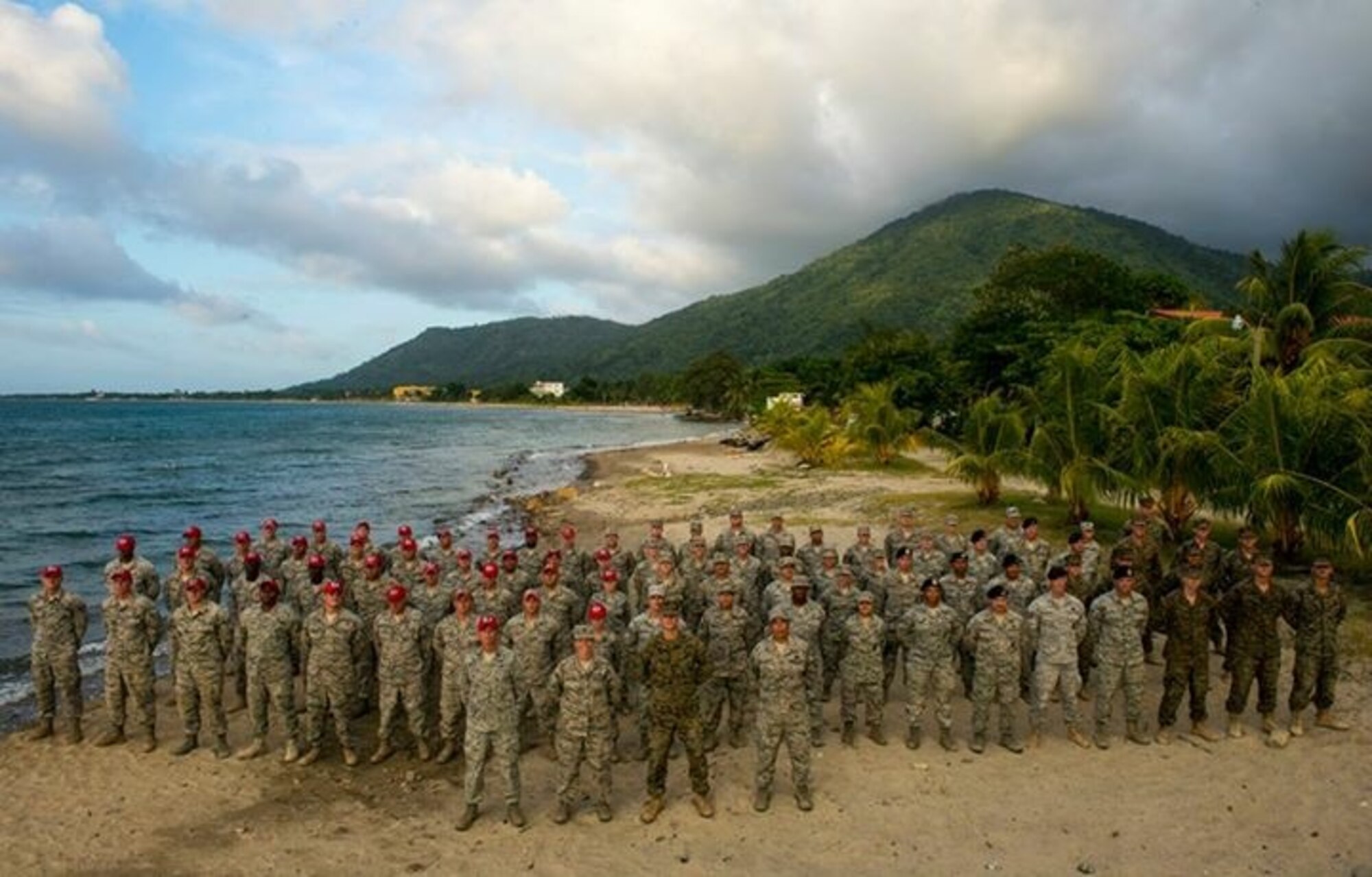 The Gabriela Mistral School that was built from support of U.S. troops displays a sign to remember their efforts. It was a two-classroom schoolhouse in Ocotes Alto. (Courtesy photo)