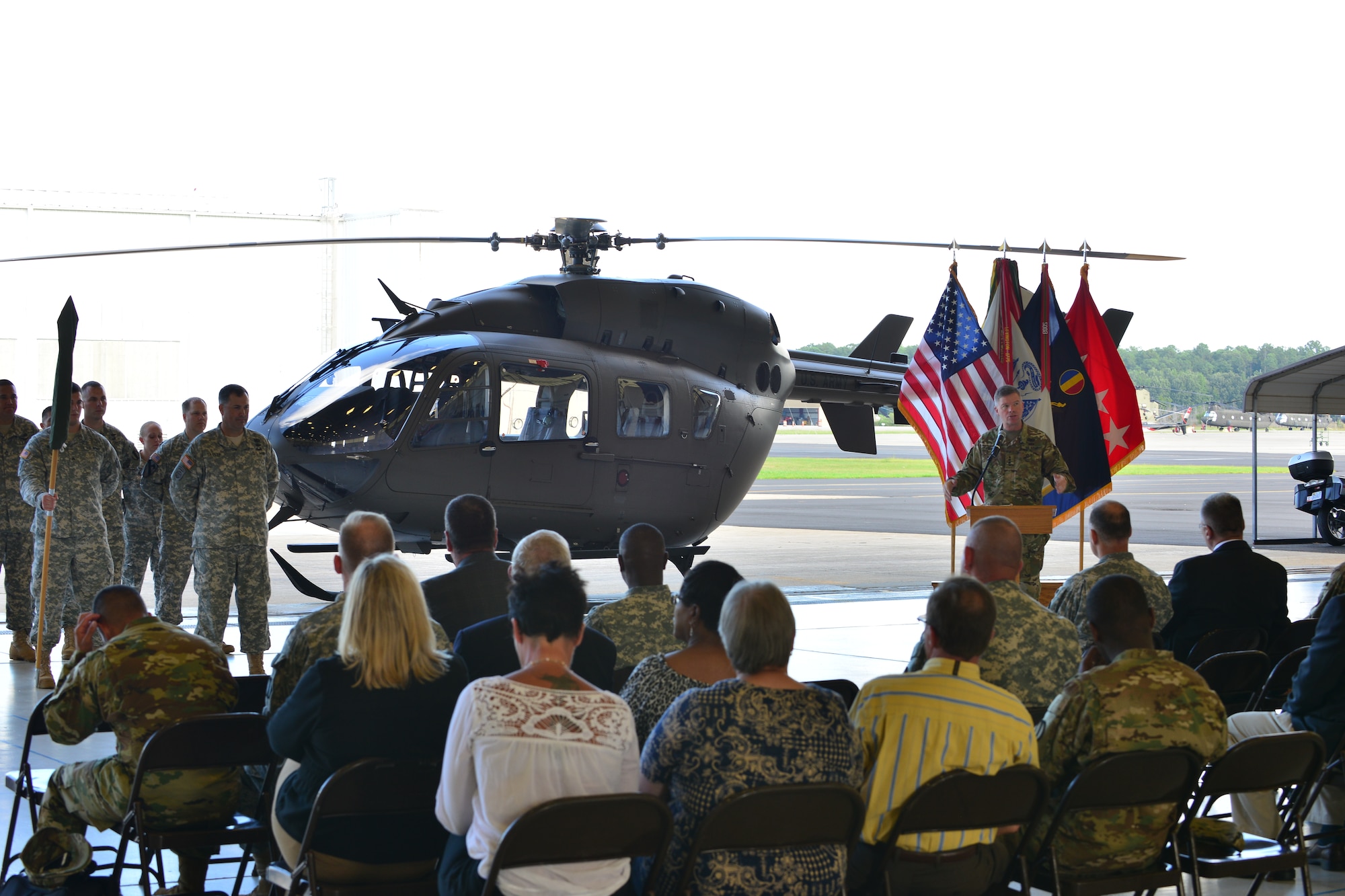 U.S. Army Gen. David G. Perkins, U.S. Army Training and Doctrine Command commander, speaks during the TRADOC Flight Detachments deactivation ceremony at Fort Eustis, Va., Sept. 8, 2015. The detachment was deactivated in accordance with the Army’s Aviation Restructuring Initiative, which moves personnel and resources while deactivating units and retiring specified aircraft. (U.S. Air Force photo by Staff Sgt. Natasha Stannard/Released)