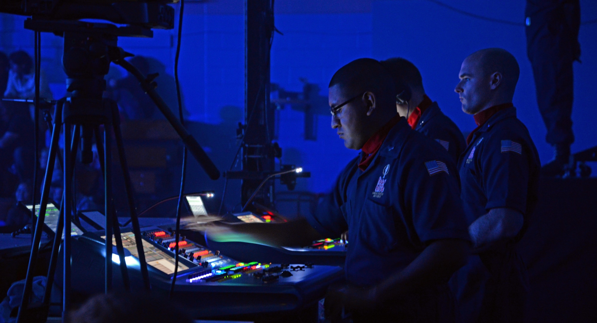 U.S. Air Force Tops in Blue technicians ensure equipment for a Tops in Blue performance is in working order Sept. 4, 2015, on RAF Mildenhall, England. The group consists of vocalist, instrumentalists and technicians. (U.S. Air Force photo by Senior Airman Christine Halan/Released) 