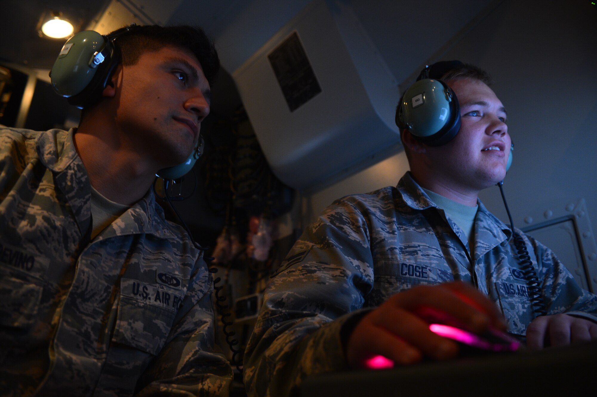 U.S. Air Force Senior Airman Isaac Martinez-Trevino and Airman 1st Class Matthew Cose, both 606th Air Control Squadron surveillance technicians, monitor Polish airspace during operations at Krzesiny Air Base, Poland as part of Aviation Detachment Rotation 15-4 Sept. 7, 2015. Members of the 606th ACS are providing tactical air control for the exercise, which includes four F-16 Fighting Falcon fighter aircraft squadrons from both the American and Polish Air Forces. Av-Det Rotation 15-4 is being hosted by the U.S. Air Force Aviation Detachment stationed at Łask Air Base, Poland, and is the latest training exercise designed to strengthen the interoperability of NATO allies. (U.S. Air Force photo by 2nd Lt. Meredith Mulvihill/Released) 