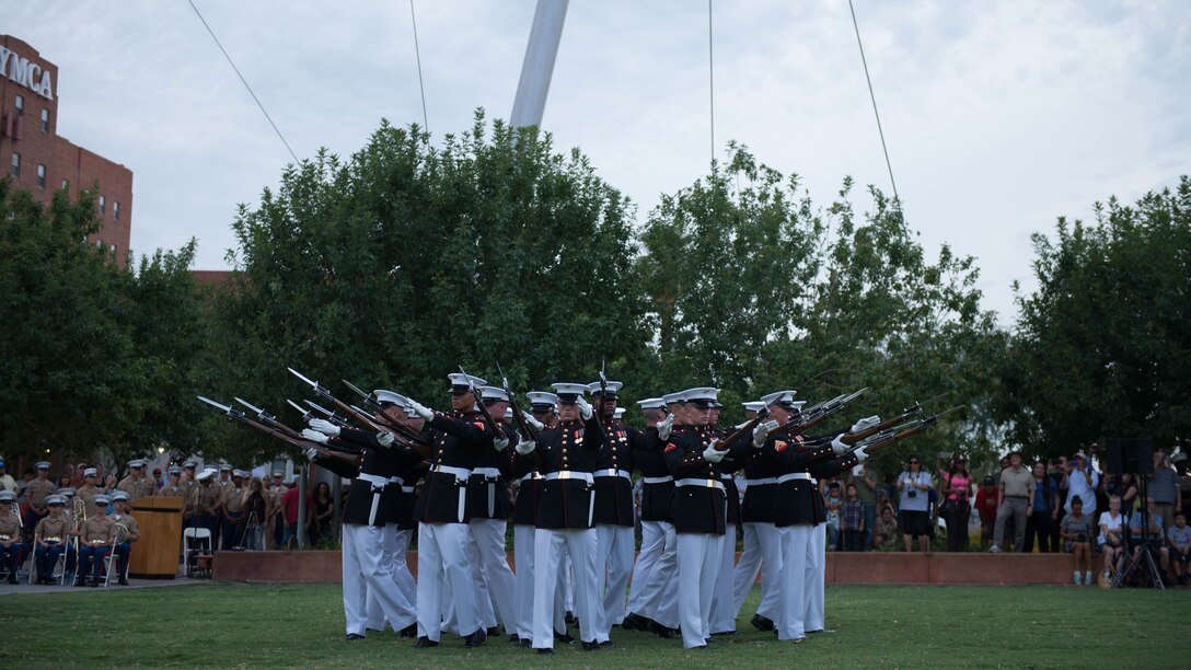 The United States Marine Corps Silent Drill Platoon preforms a series of rifle maneuvers at Civic Space Park, Phoenix, Sept. 9, 2015, as part of the opening ceremony for Marine Week Phoenix. Marine Week Phoenix allows the local community to see the Marine Corps in a way that they would not normally be able to experience.