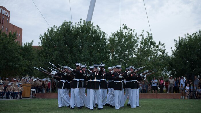 The United States Marine Corps Silent Drill Platoon preforms a series of rifle maneuvers at Civic Space Park, Phoenix, Sept. 9, 2015, as part of the opening ceremony for Marine Week Phoenix. Marine Week Phoenix allows the local community to see the Marine Corps in a way that they would not normally be able to experience.