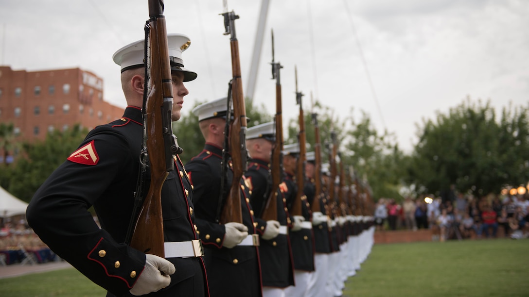 The United States Marine Corps Silent Drill Platoon preforms a series of rifle maneuvers at Civic Space Park, Phoenix, Sept. 9, 2015, as part of the opening ceremony for Marine Week Phoenix. Marine Week Phoenix allows the local community to see the Marine Corps in a way that they would not normally be able to experience.