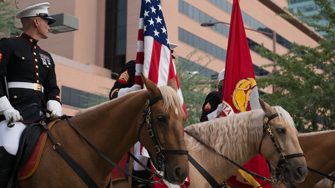 A Marine Corps mounted color guard prepares to present the colors at Civic Space Park, Phoenix, Sept. 9, 2015, as part of the opening ceremony for Marine Week Phoenix. Marine Week Phoenix allows the local community to see the Marine Corps in a way that they would not normally be able to experience.