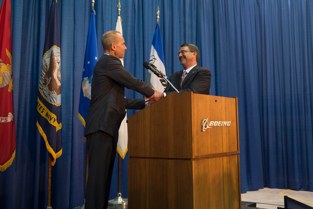 Dennis Muilenburg, president and chief executive officer of The Boeing Company thanks Defense Secretary Ash Carter for coming to St. Louis, Mo., to speak with workers at Boeing, Sept. 9, 2015. Carter delivered remarks at the Defense Advanced Research Projects Agency’s “Wait, What?" future technology forum. DoD photo by U.S. Air Force Senior Master Sgt. Adrian Cadiz