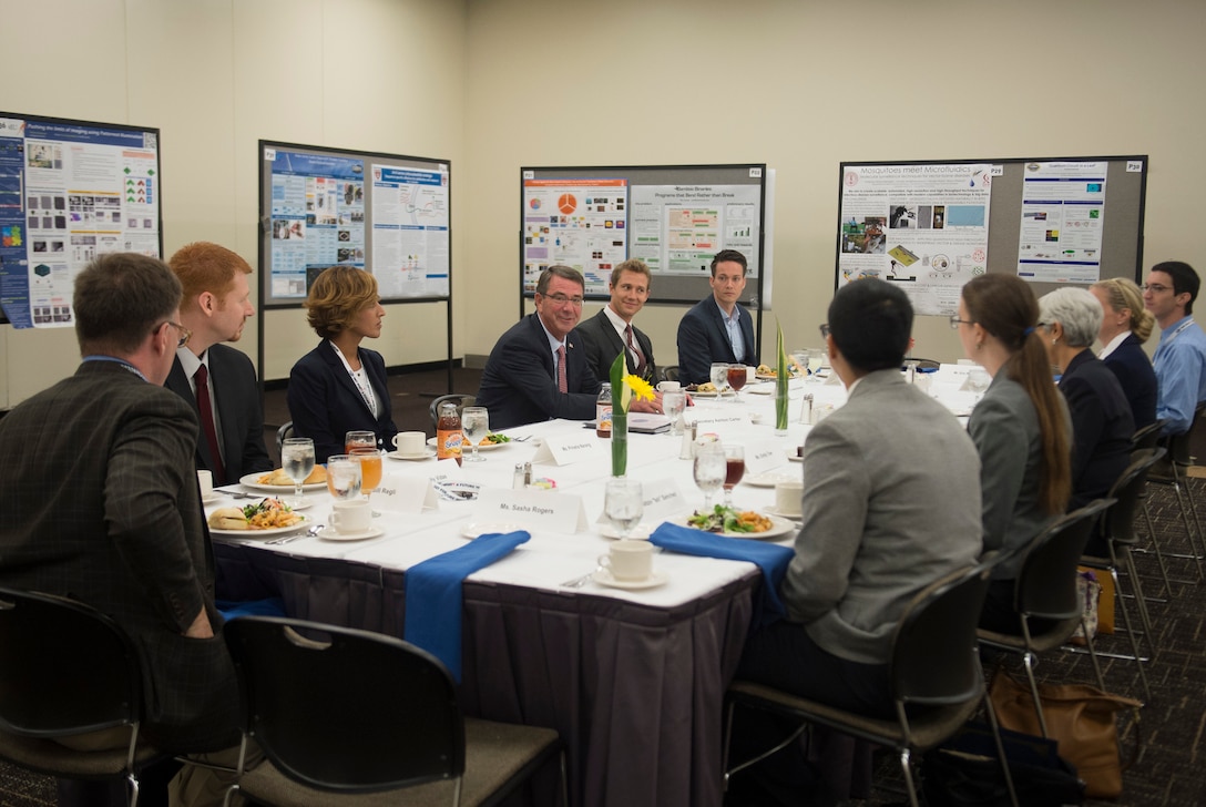 Defense Secretary Ash Carter, center, speaks with a group Defense Advanced Research Projects Agency rising stars over lunch as he attends the DARPA “Wait, What?" future technology forum in St. Louis, Mo., Sept. 9, 2015. DoD photo by U.S. Air Force Senior Master Sgt. Adrian Cadiz