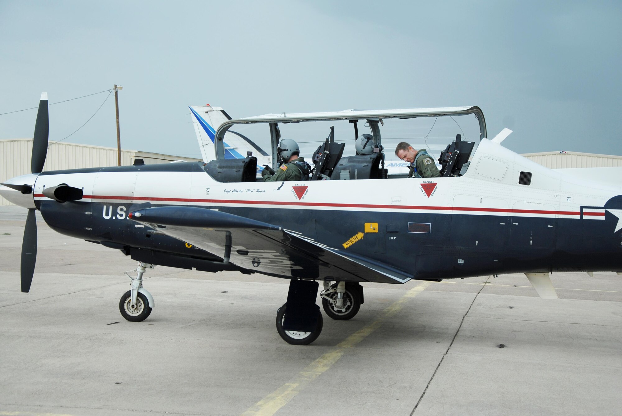 U.S. Air Force Brig. Gen. John A. Cherrey, Air Education and Training Command Intelligence, Operations and Nuclear Integration Director, and Capt. Mike J. Lucky, 559th Flying Training Squadron T-6 pilot to instructor training instructor, prepare for takeoff at Mathis Field, San Angelo, Texas, Sept. 9, 2015. Brig. Gen. Cherrey visited Goodfellow Air Force Base, Texas, to learn about the training conducted on base. (U.S. Air Force photo by Senior Airman Joshua Edwards/Released)