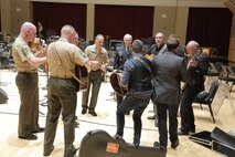 On Sept. 8, 2015, Chairman of the Joint Chiefs Gen. Martin Dempsey and the Irish folk-group the High Kings joined the Marine Band's Irish ensemble for a jam session in the John Philip Sousa Band Hall at the Marine Barracks Annex in Washington, D.C. The visit also included a tour of the building, led by Marine Band Director Lt. Col. Jason Fettig. (U.S. Marine Corps photo by Master Sgt. Kristin duBois/released)