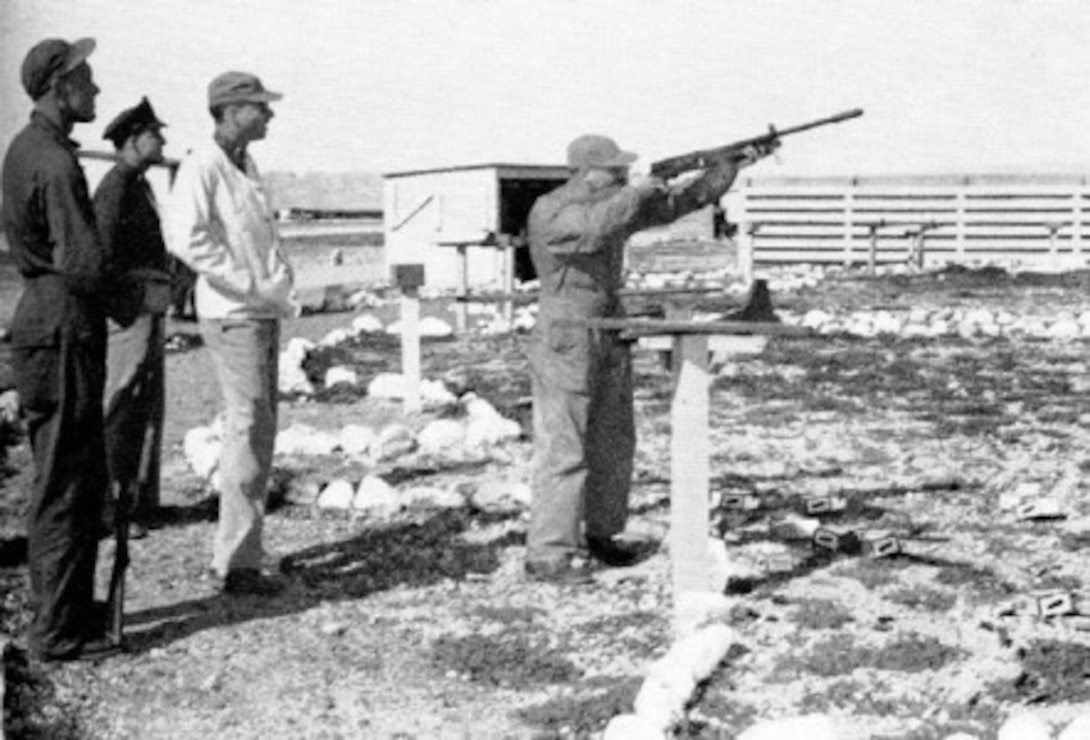 Gunnery students and instructor on the skeet range. Kingman Ground-to-Ground Gunnery Range 
Source: Kingman Army Airfield
Historical Society. 
