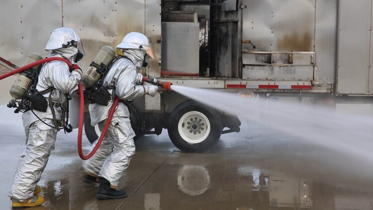 Marines with Aircraft Rescue and Firefighting aboard Marine Corps Air Station Miramar, California, extinguish a simulated aircraft fire during a mishap response exercise aboard MCAS Miramar, Sept. 3. Marines with ARFF worked alongside the installation’s fire department during the required training.
