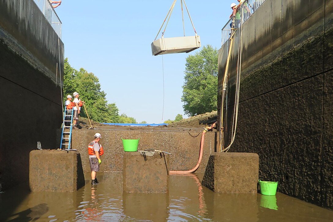 The staff of C.J. Brown Dam and Reservoir, Caesar Creek Lake and William Harsha Lake dewater and inspect the C.J. Brown stilling basin Sept. 1, 2015. The last dewatering was in 1996.
					
