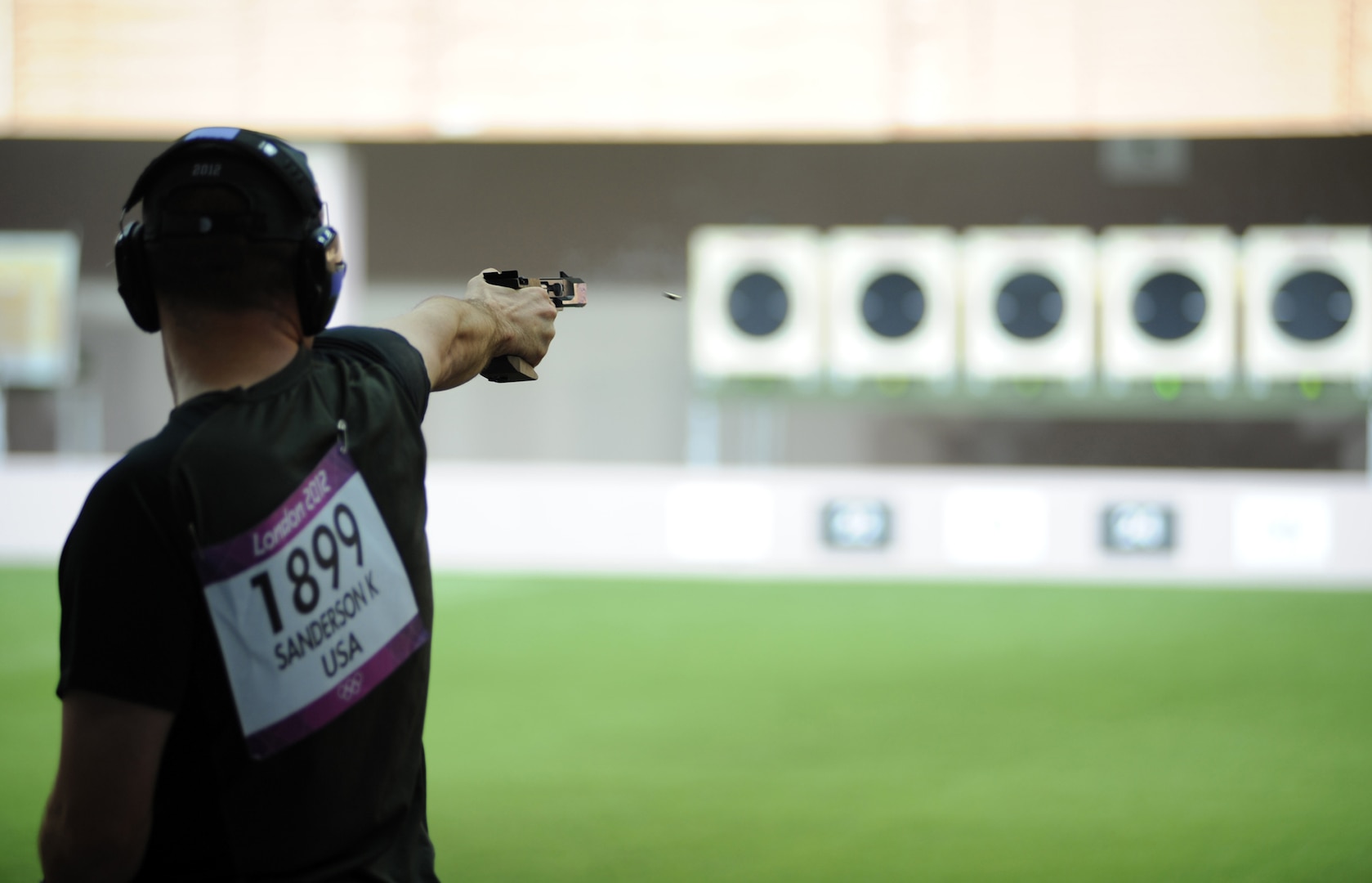 U.S. Army World Class Athlete Program marksman SFC Keith Sanderson shoots into 14th place with a score of 288 in stage one qualification of the Olympic men's 25-meter rapid fire pistol event Aug. 2 at the Royal Artillery Barracks in London. U.S. Army photo by Tim Hipps, IMCOM Public Affairs