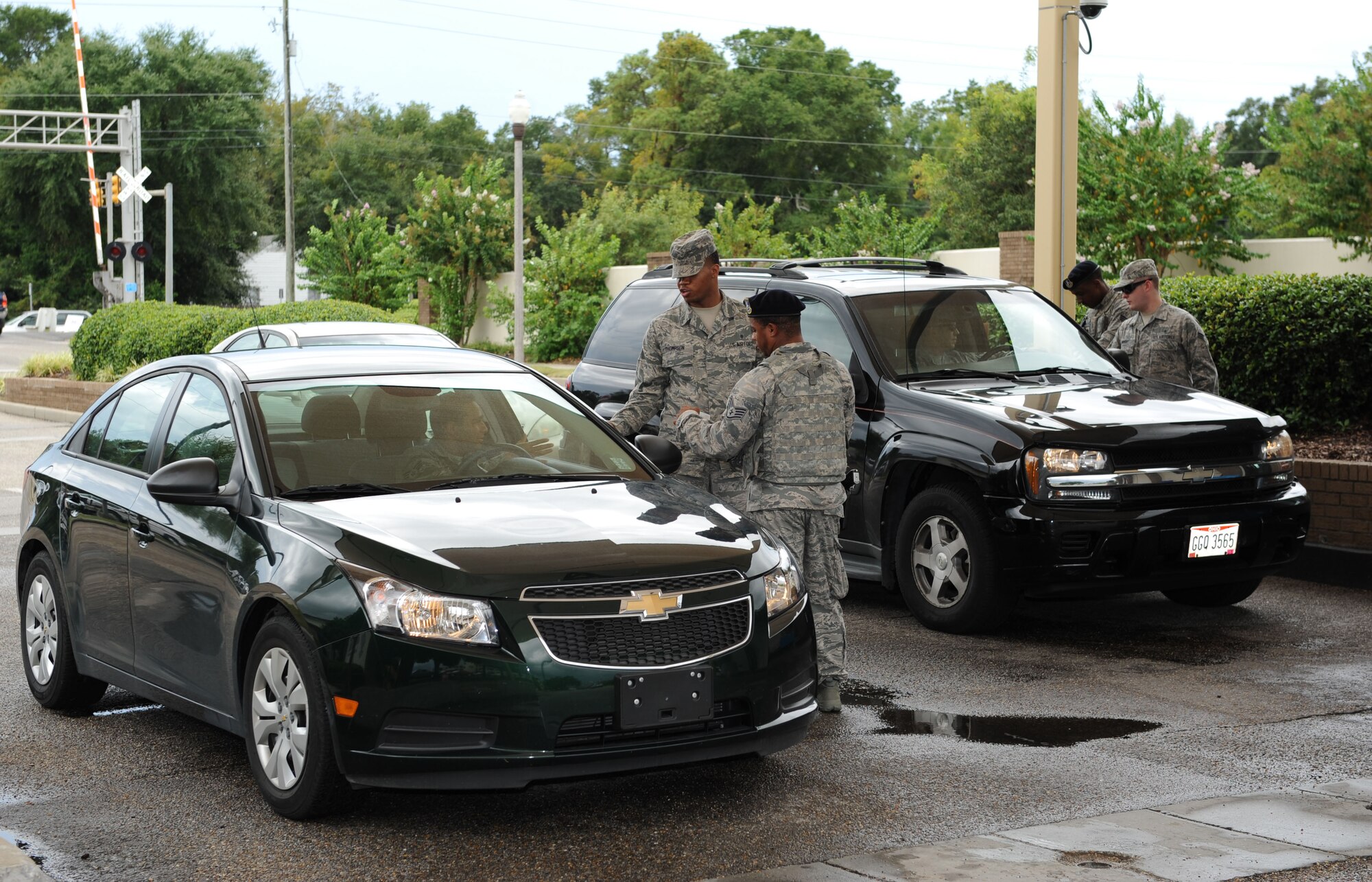 Members from the 81st Medical Operations Squadron mental health clinic hand out suicide prevention stress balls to Keesler personnel as they enter the base Sept. 10, 2015, Keesler Air Force Base, Miss. Today is World Suicide Prevention Day and Keesler will be raising awareness for suicide prevention throughout September. (U.S. Air Force photo by Kemberly Groue)