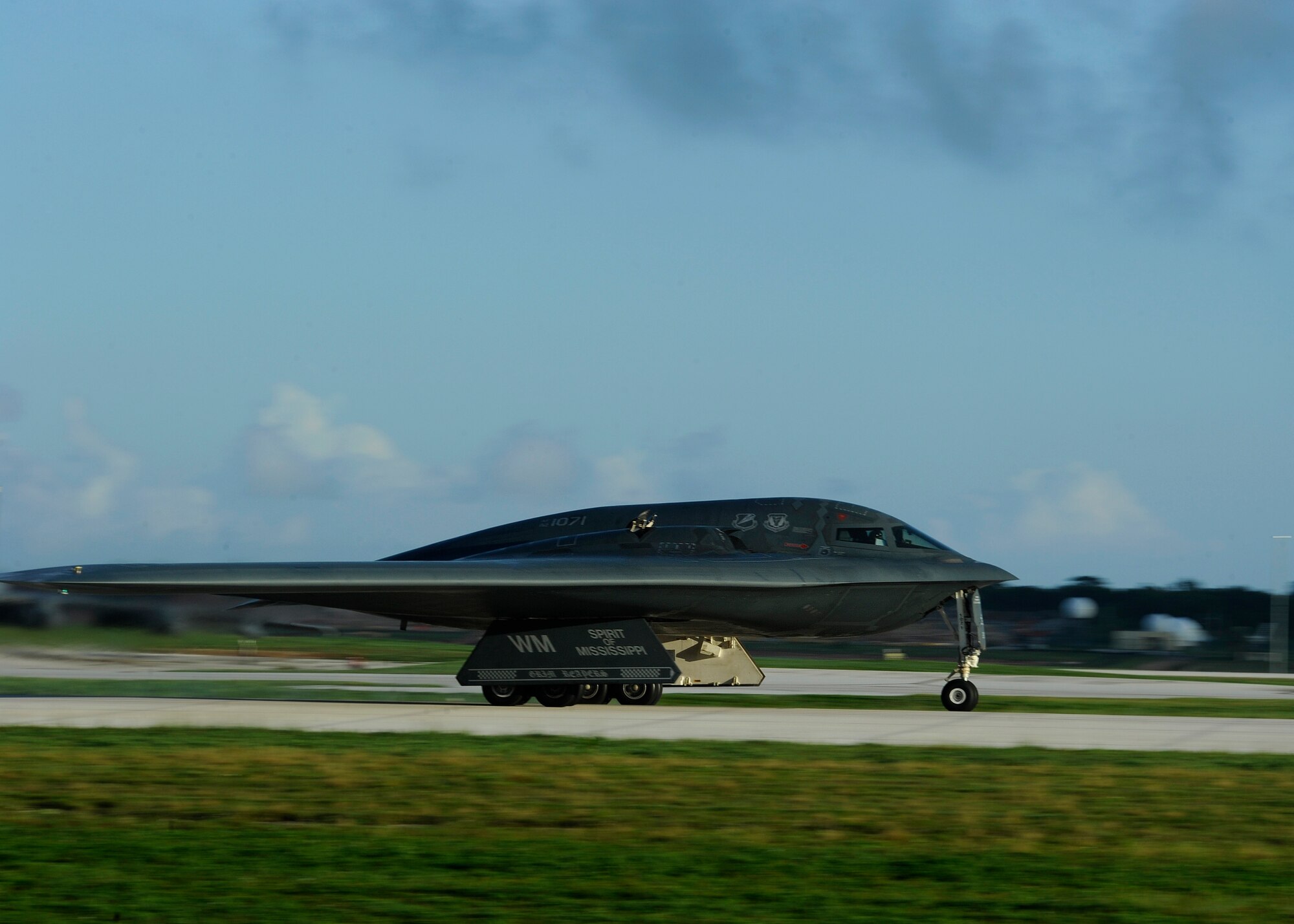 A B-2 Spirit bomber from Whiteman Air Force Base, Mo., departs Andersen Air Force Base, Guam, Aug. 27, 2015, for its last sortie before returning home upon completion of an extended deployment in the Pacific. Whiteman deployed approximately 225 Airmen and three B-2s here to conduct familiarization training in the Indo-Asia-Pacific region. (U.S. Air Force photo by Senior Airman Joseph A. Pagán Jr./Released)
